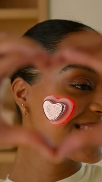 Video showing woman putting on the LED Face Mask Pro