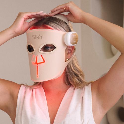 Woman wearing the LED Face Mask Pro