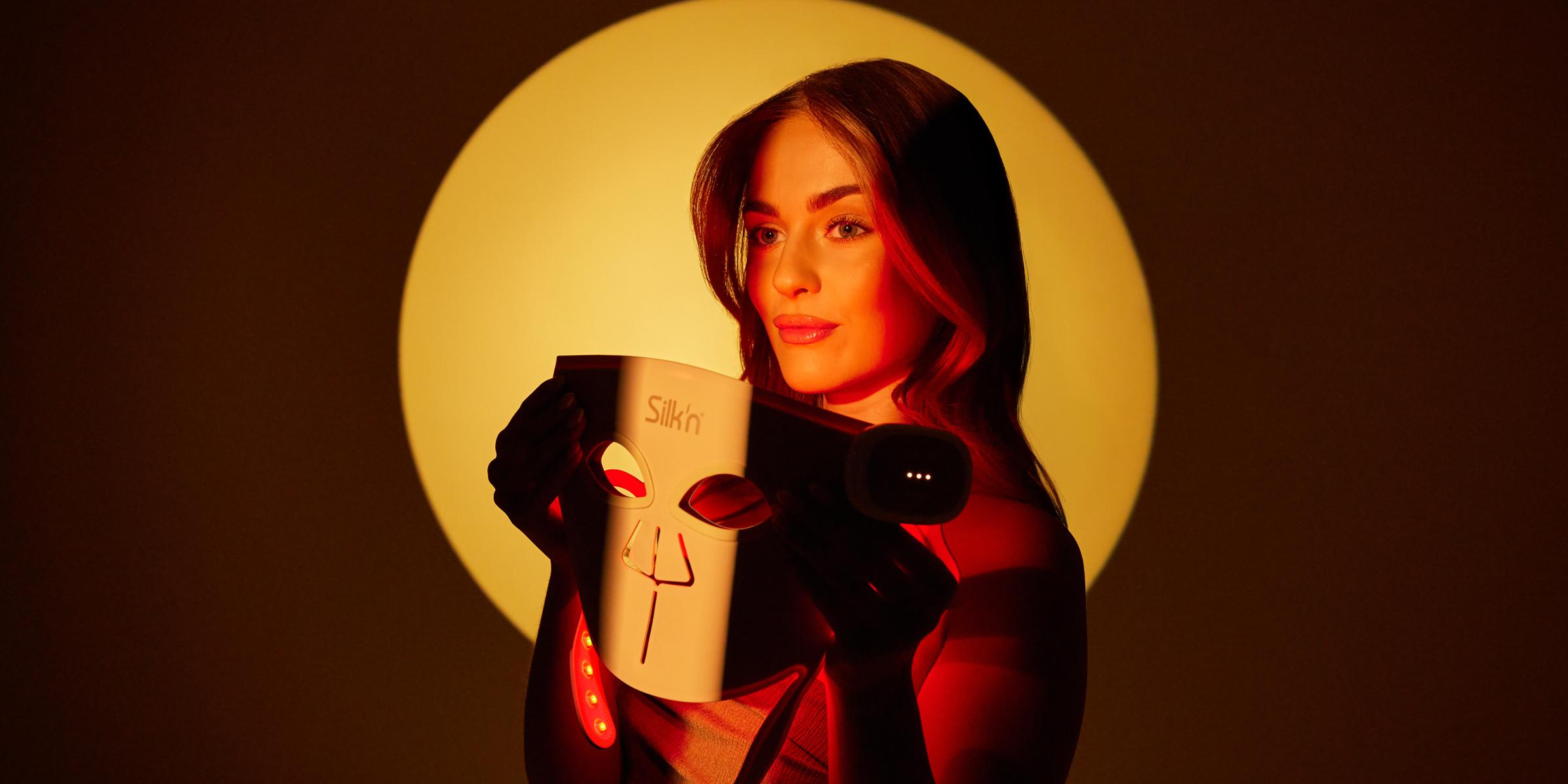 Woman wearing the Silk'n LED Face Mask Pro