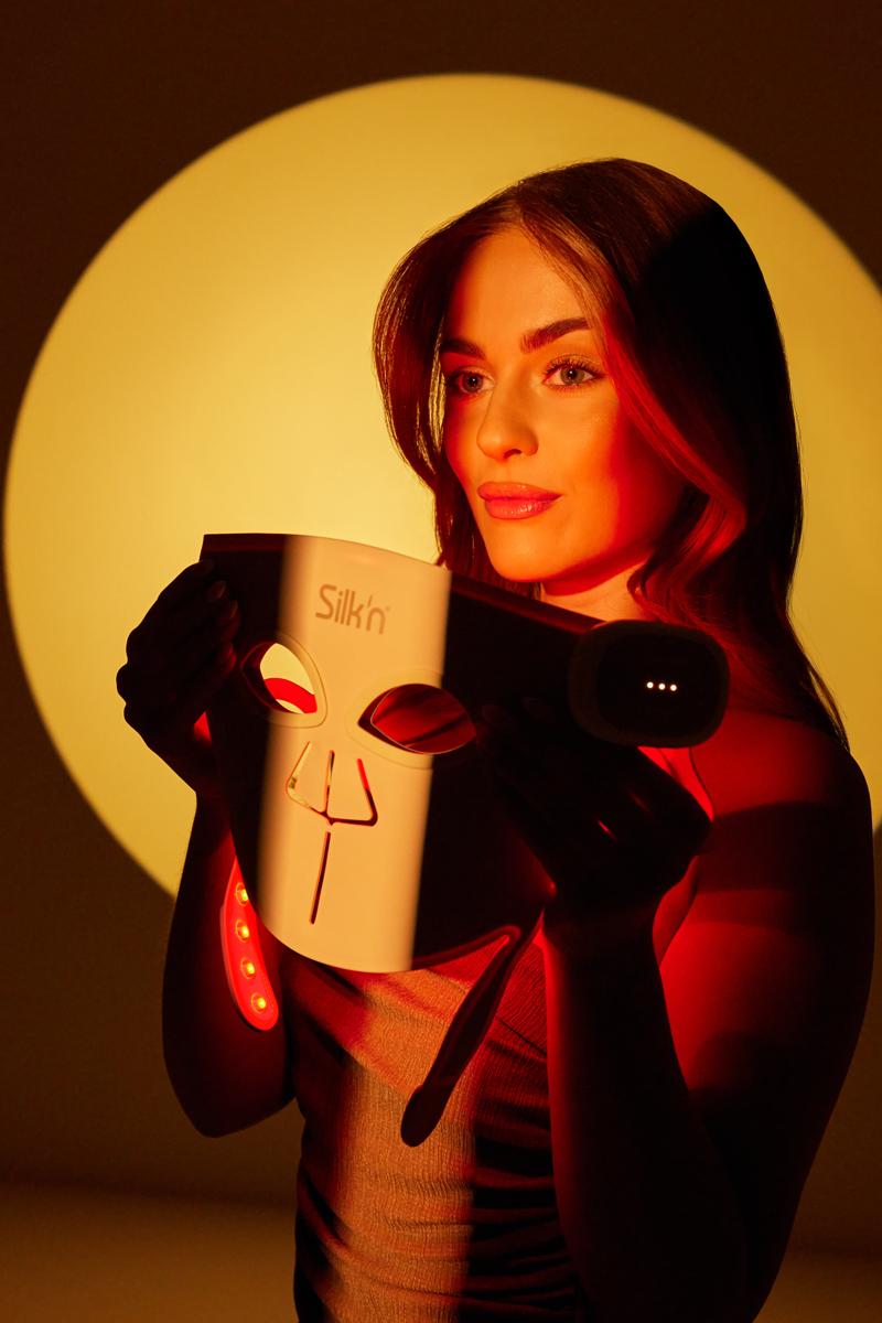 Woman wearing the Silk'n LED Face Mask Pro