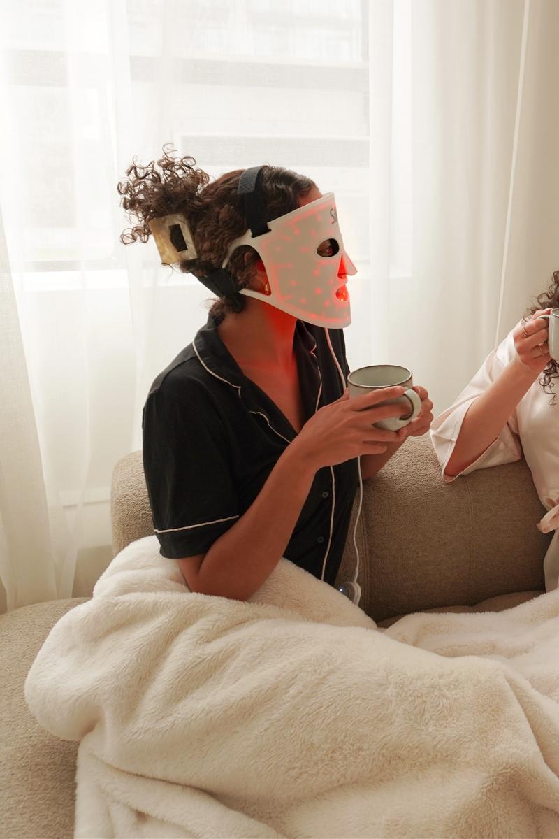 Woman using Silk'n LED Face Mask 100